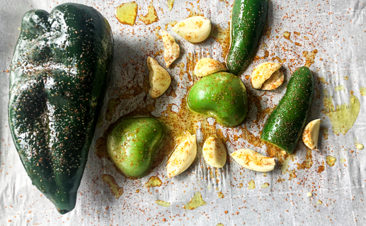 seasoned peppers and garlic on parchment paper