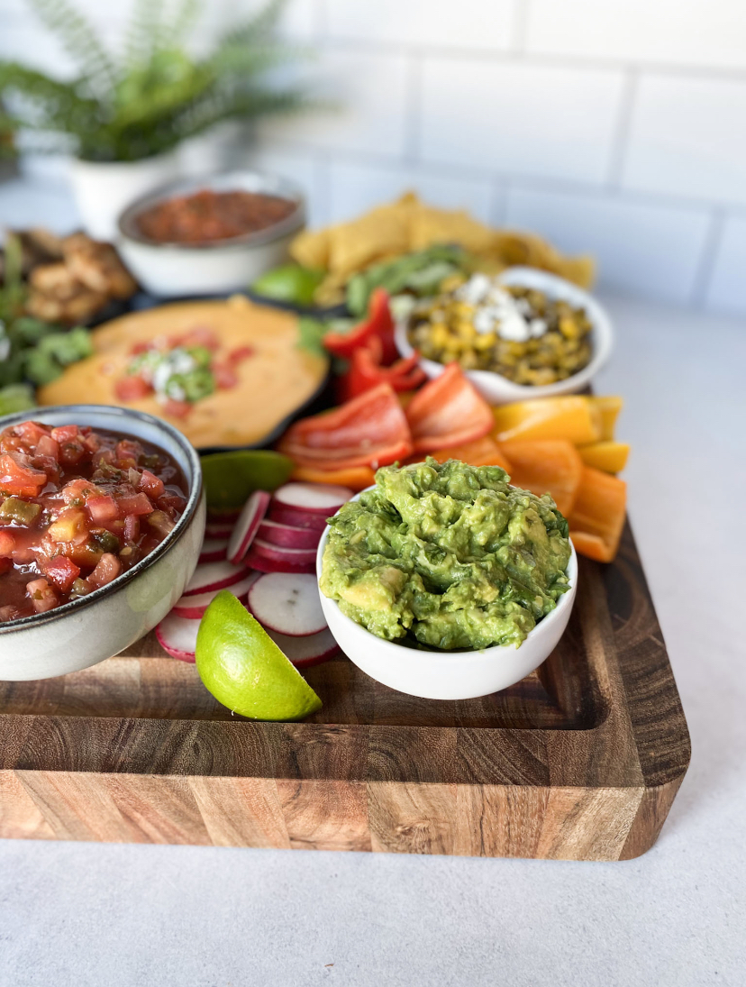 Tex Mex Style Nacho board and wooden cutting board.