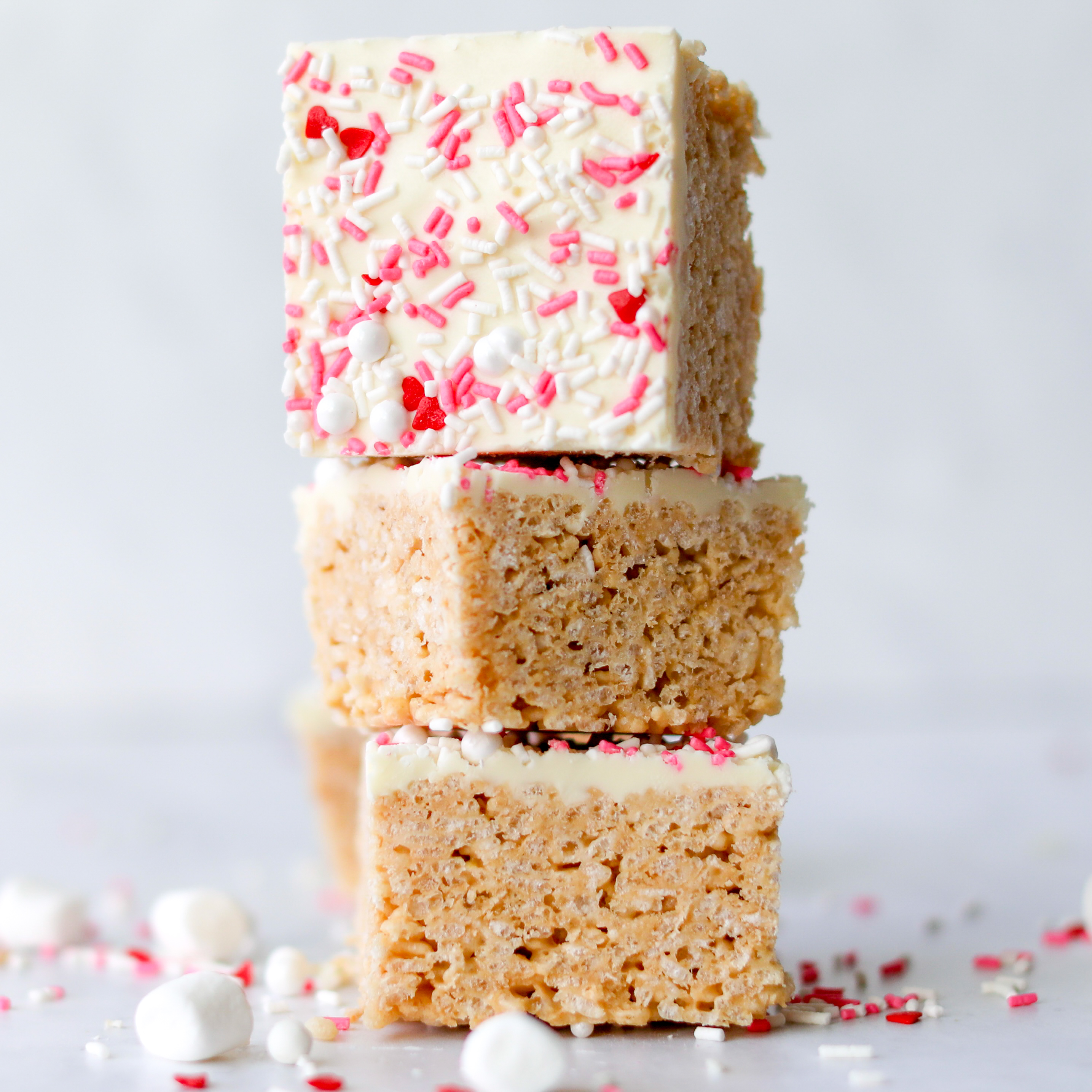 Valentine's Cereal Bar 3 Cereal Bars Stacked with One showing top of cereal bar with sprinkles.