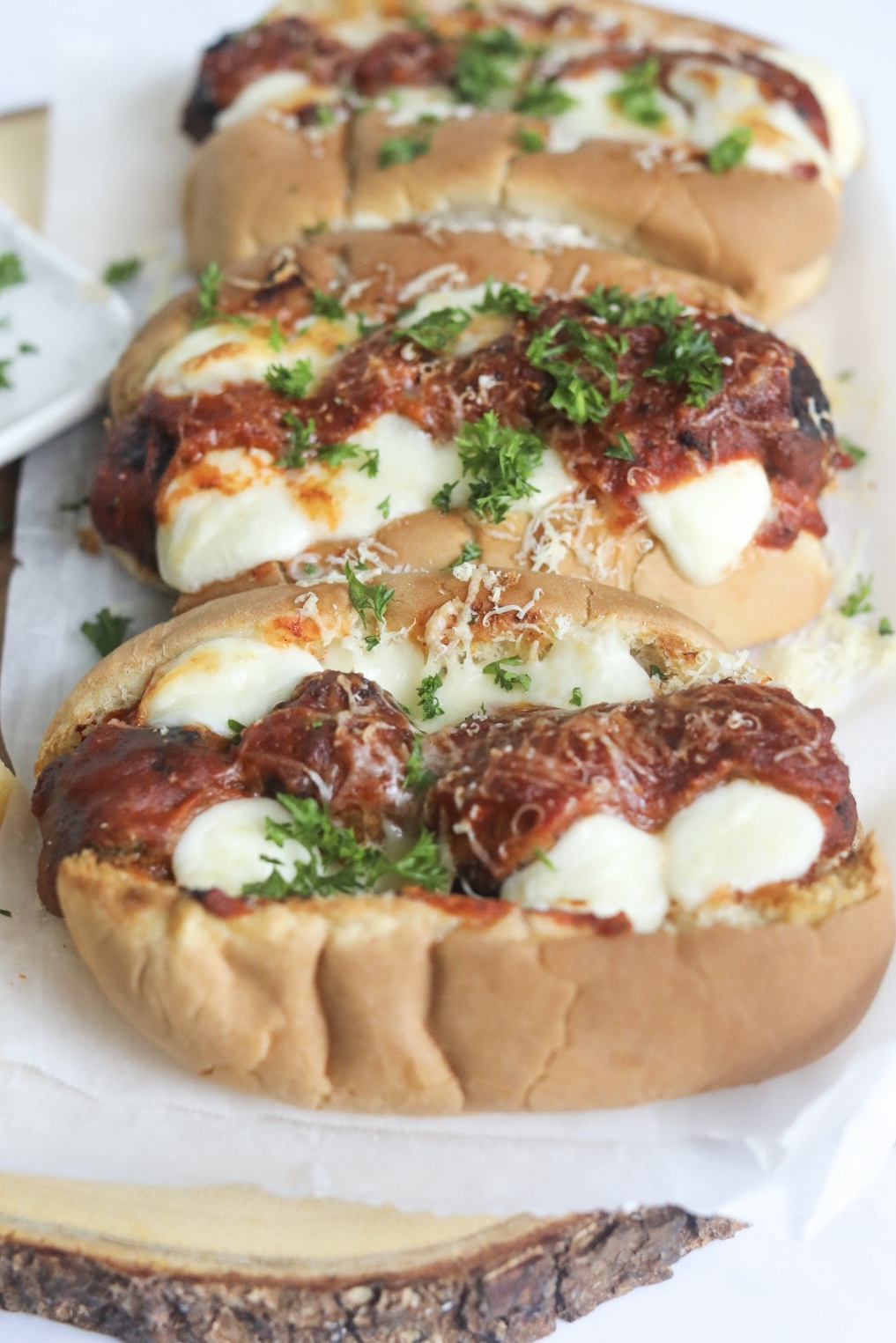 meatball sandwiches lined up one after the other