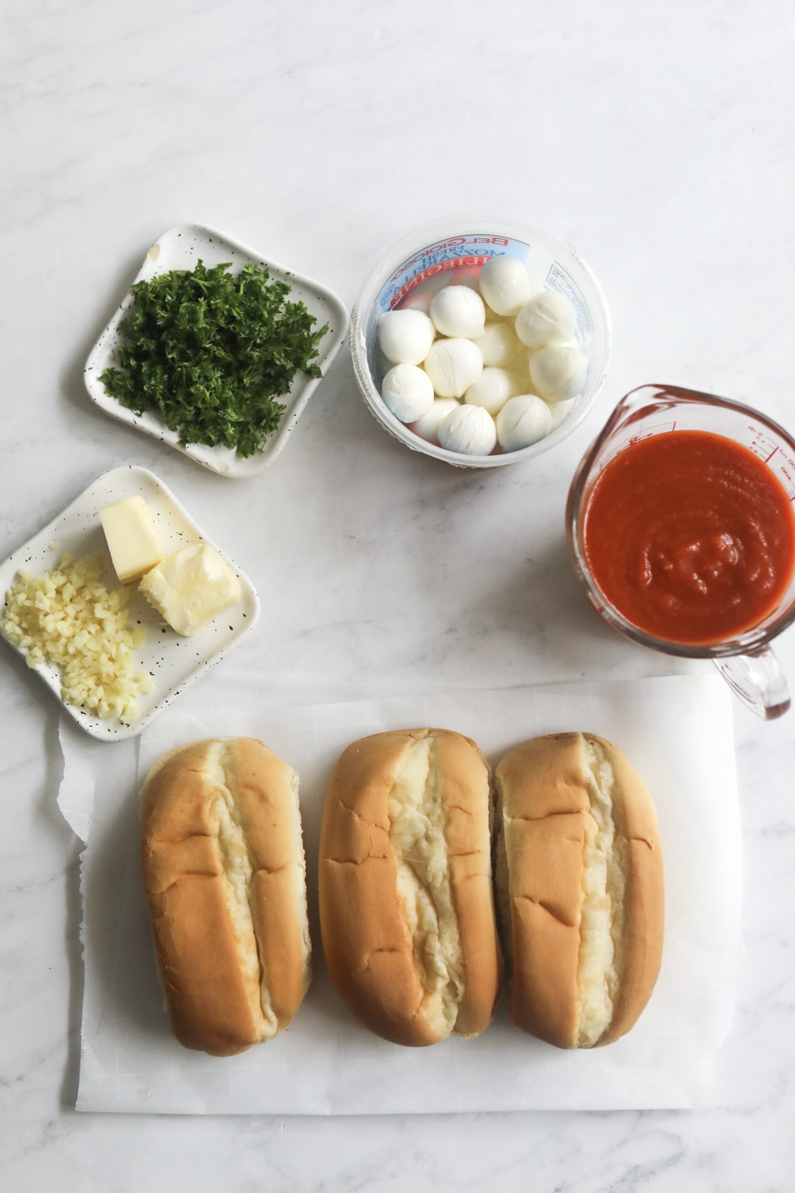 overhead view of ingredients needed to assemble hoagies