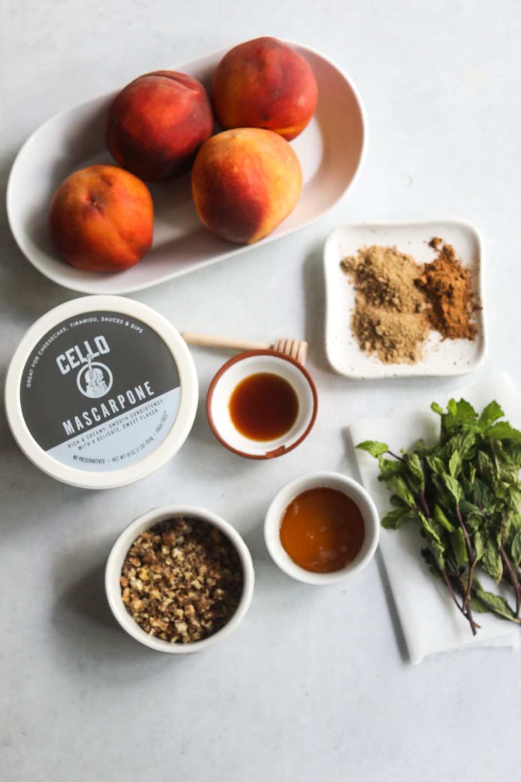 overhead view of the ingredients needed to make grilled peaches with mascarpone