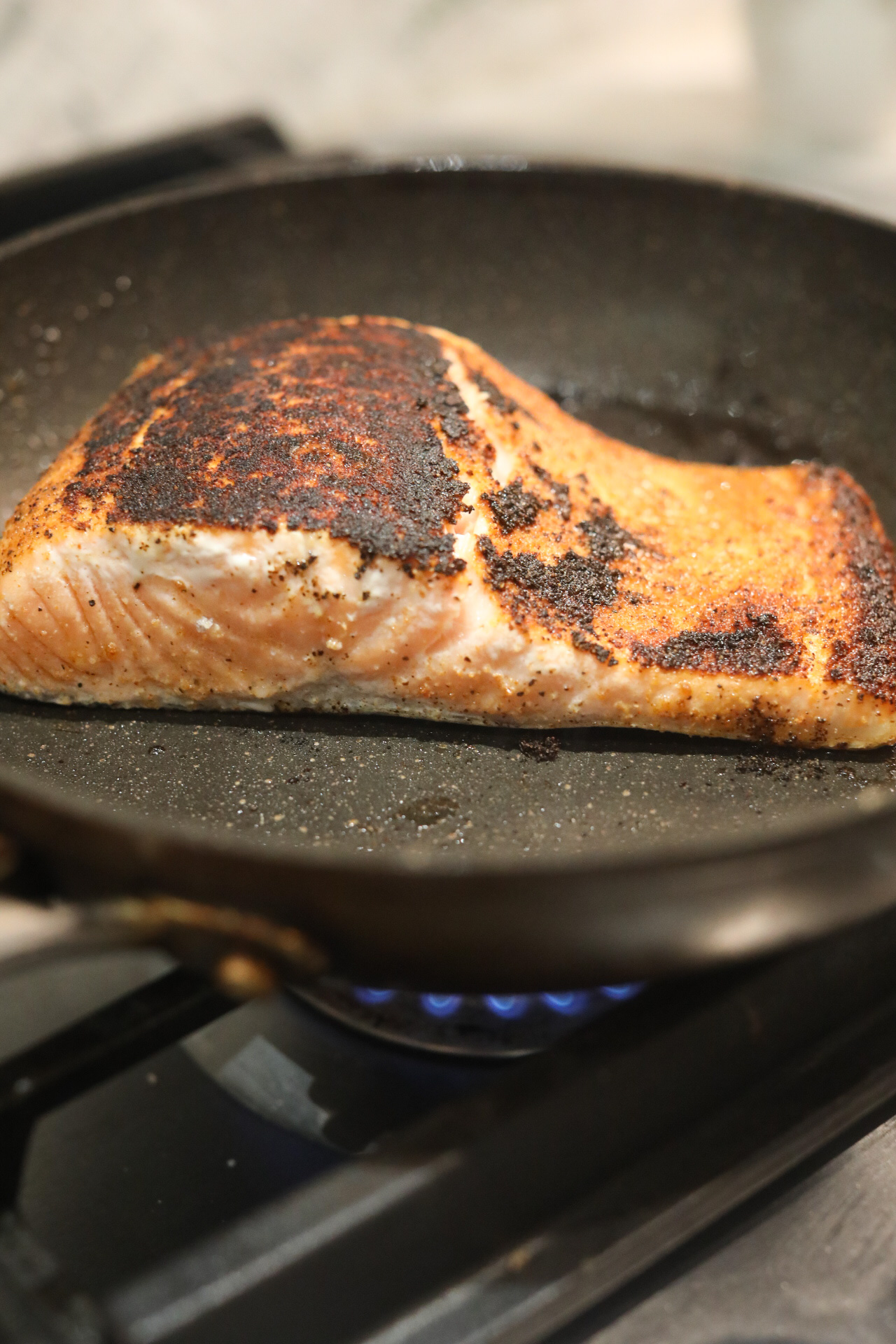 seared salmon for seafood jambalaya salmon searing in the pan