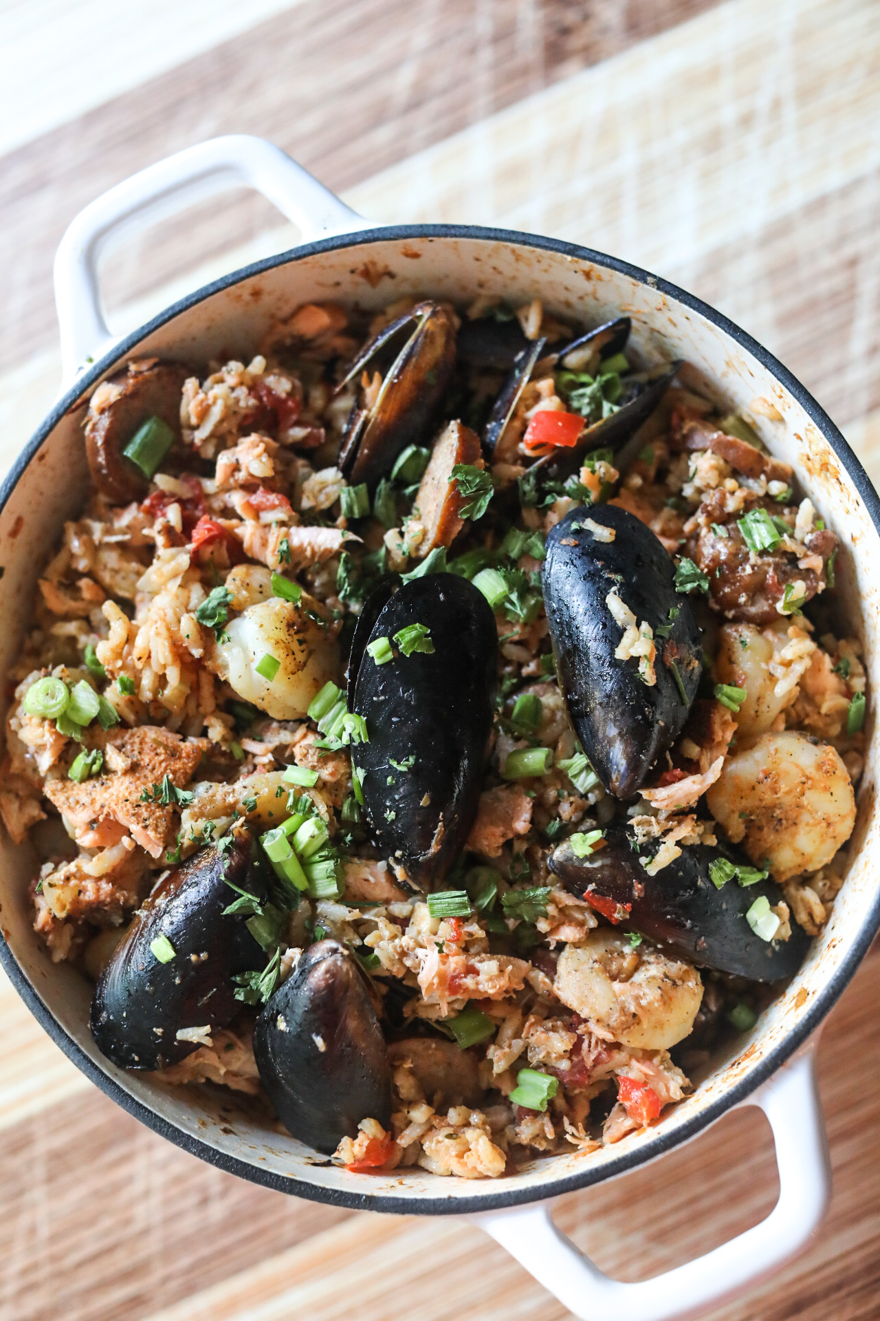 a pot full of jambalaya with seafood