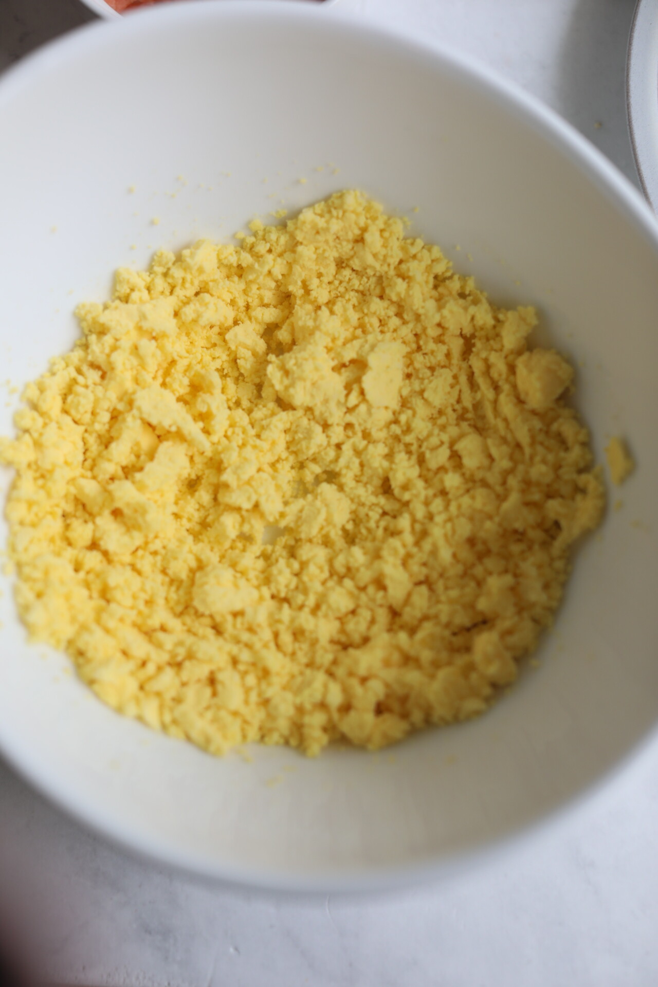 lox deviled eggs a bowl of boiled egg yolks