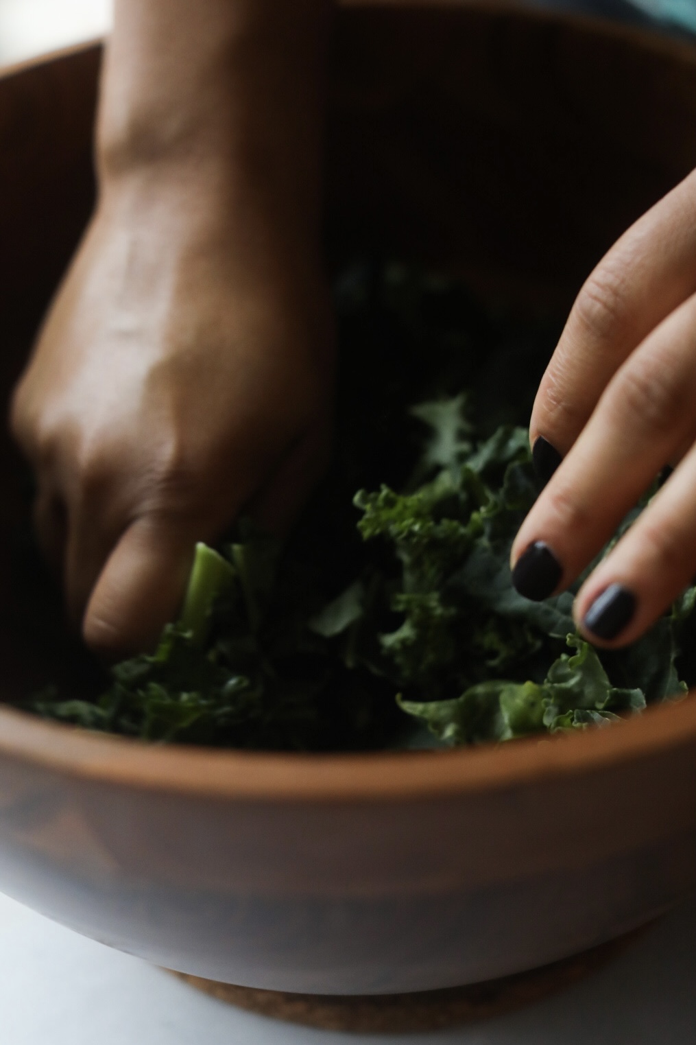 massaging kale for salad