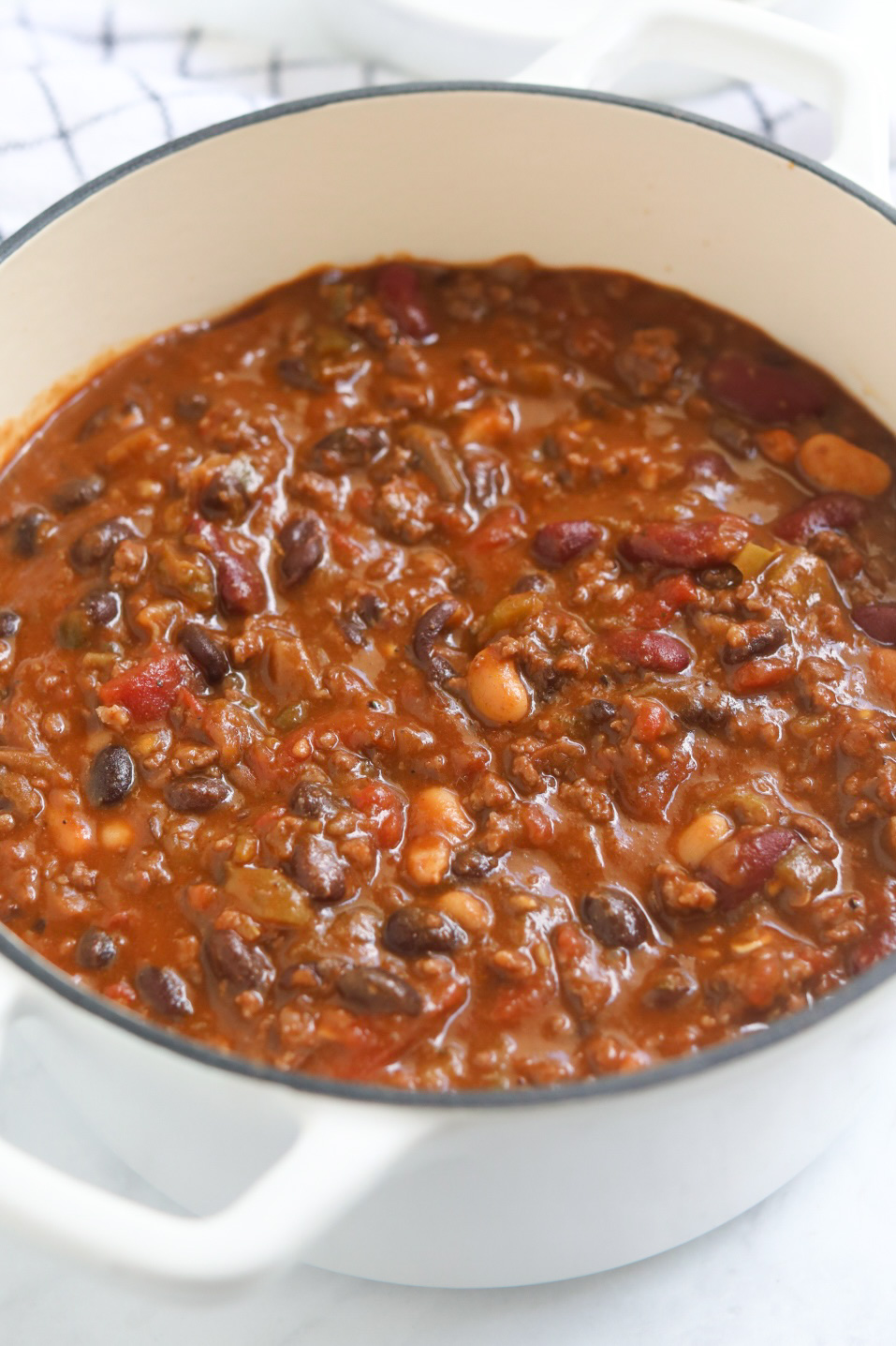 seasoned to taste blog sweet chili Sweet chili complete recipe in a large white soup pot.