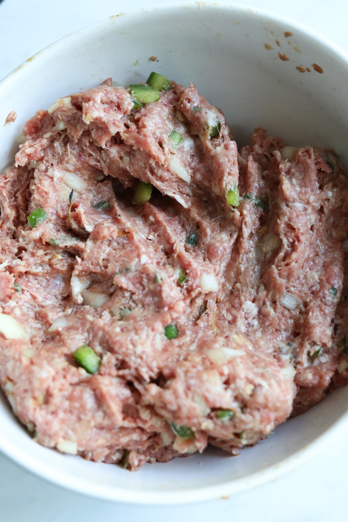 Meatloaf in a bowl mixed.