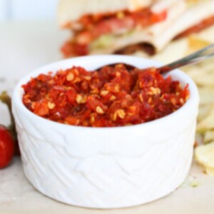 a saucer full of cherry pepper relish