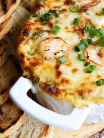 a casserole dish filled with seafood dip