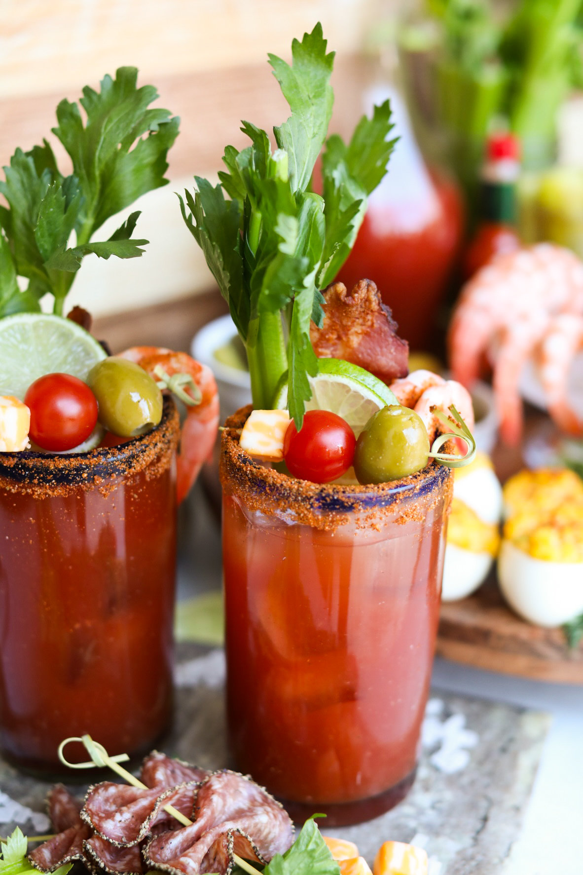 close up view of two glasses of bloody mary