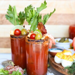 close up view of two glasses of Bloody Mary cocktails