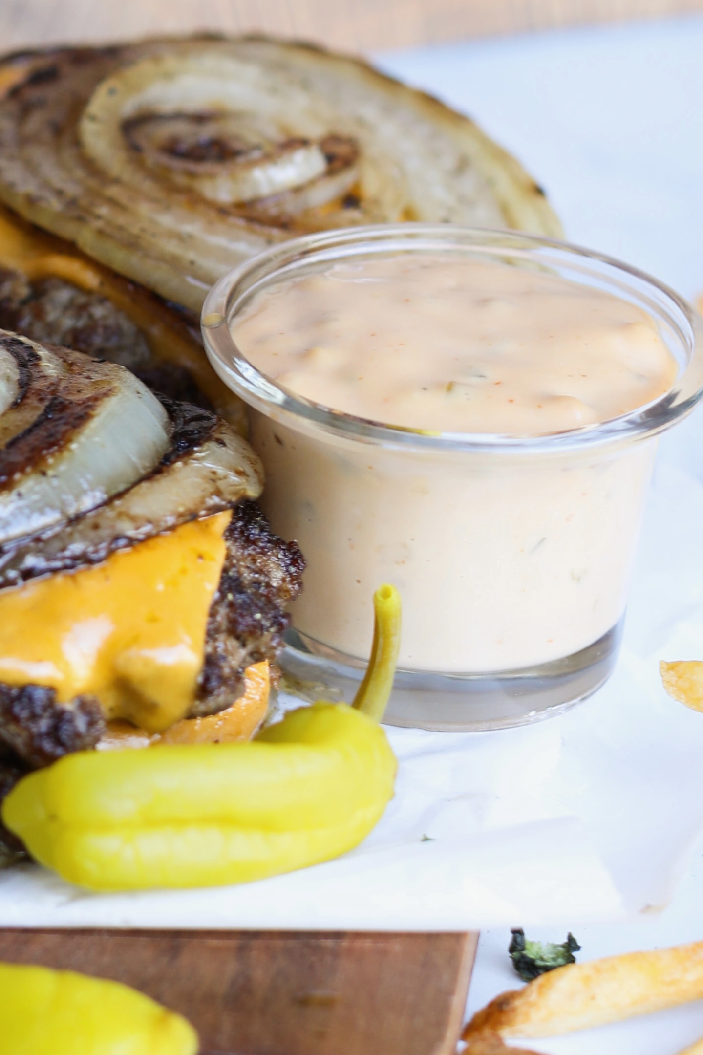 In and Out Burger Sauce in a small glass container.